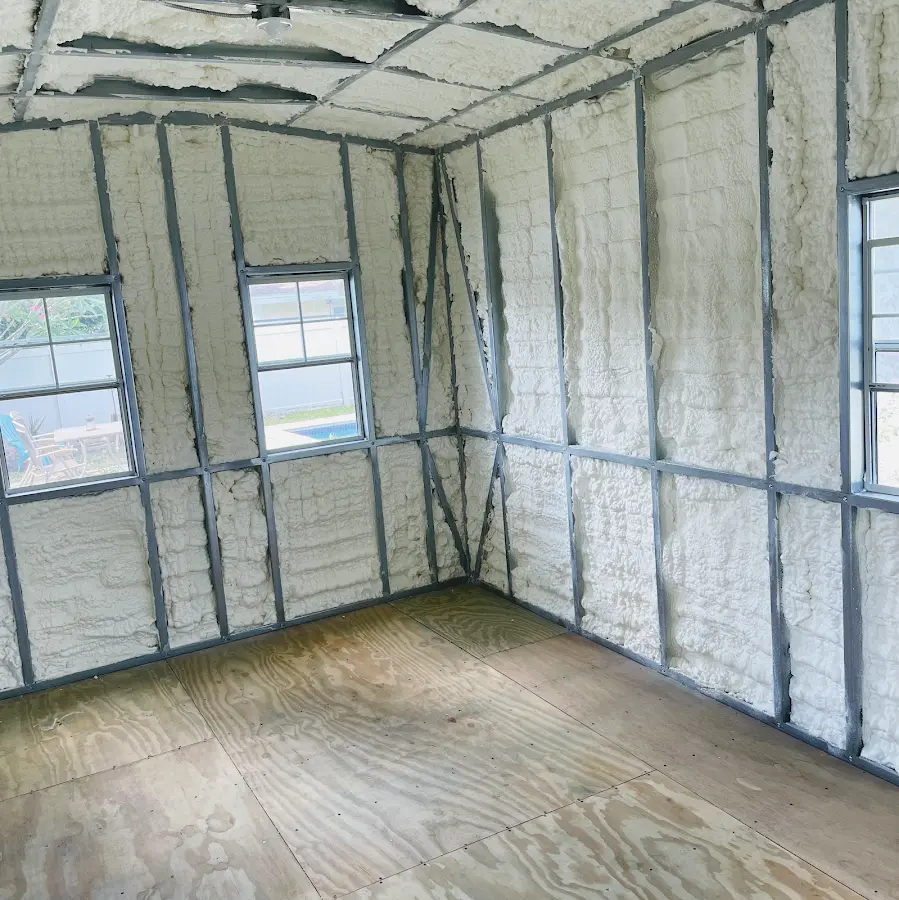 Closed-cell spray foam insulation applied to wall cavities in a residential project in New Boston